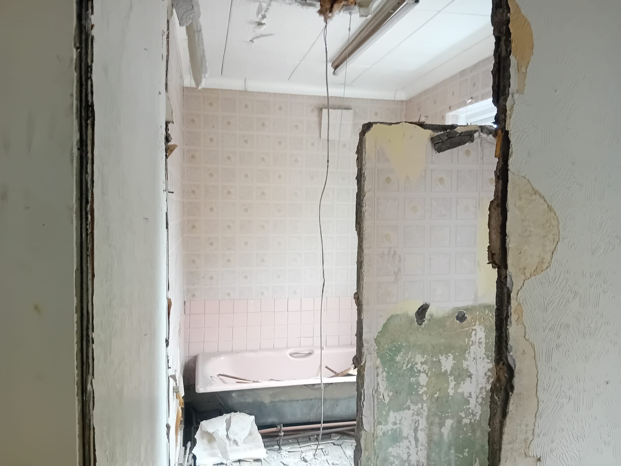 Lower Lane, Liverpool — bathroom entrance during strip-out