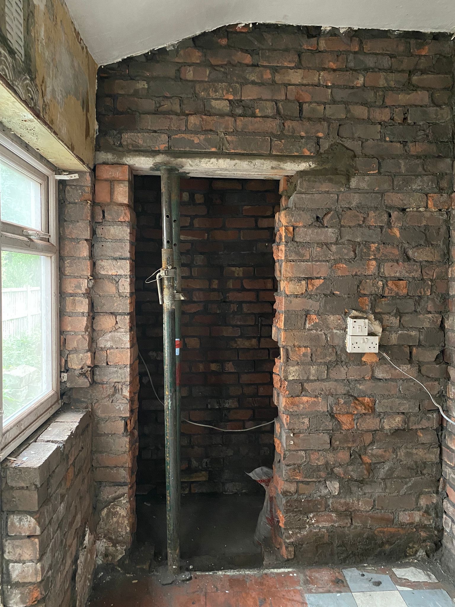 Exposed brickwork during strip-out